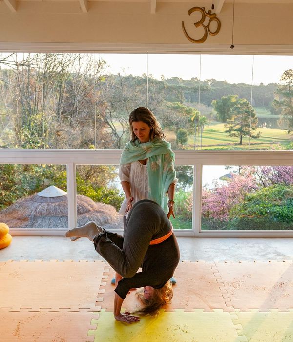 Woman in a calm yoga pose symbolizing harmony and balance.
